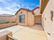 Private patio features stucco walls and desert landscaping at 7757 Coast Jay St, North Las Vegas, NV 89084