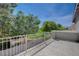 Balcony view of the golf course, mature trees, and the sunny blue sky at 7905 Brent Leaf Ave, Las Vegas, NV 89131