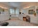 Spacious bathroom with double vanities, a soaking tub, and plenty of natural light at 7905 Brent Leaf Ave, Las Vegas, NV 89131