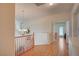 Open hallway with a view of a sitting area and a charming chandelier at 7905 Brent Leaf Ave, Las Vegas, NV 89131