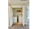 Hall laundry closet featuring washer and dryer at 880 Glitter Glen Ct, Las Vegas, NV 89123