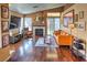 Inviting living room featuring a cozy fireplace, hardwood floors, and comfortable seating at 951 Carnival Ave, Las Vegas, NV 89123