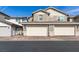 Two-story townhome with a spacious two car garage and well-maintained landscaping in a suburban neighborhood at , Henderson, NV 89015