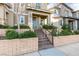 Inviting front porch with a brick pathway and lush landscaping, perfect for relaxing at , Henderson, NV 89015