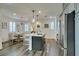 Bright kitchen with an island, modern appliances, and an adjacent dining area at , Henderson, NV 89015