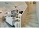 Open-concept living area with a staircase, seamlessly connecting the kitchen and dining spaces at , Henderson, NV 89015