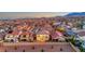 Expansive aerial view of the neighborhood, displaying lush backyard, and the beautiful surrounding scenery at 10184 Fire Skye Ave, Las Vegas, NV 89166