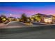 Beautiful street view of the community with desert landscaping at entrance at 10184 Fire Skye Ave, Las Vegas, NV 89166