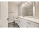 Bathroom with a white vanity, quartz countertop, and a walk-in shower with glass door at 1050 E Cactus Ave # 1049, Las Vegas, NV 89183