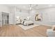 Spacious main bedroom featuring high ceilings, hardwood floors, and neutral tones at 10644 San Vercelli Ct, Las Vegas, NV 89141