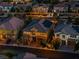 Aerial view of a neighborhood featuring tile roofs, attached garages and well-manicured landscaping at 12279 Lost Treasure Ave, Las Vegas, NV 89138