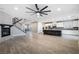 Living room and open-concept kitchen with modern decor and plenty of natural light at 12279 Lost Treasure Ave, Las Vegas, NV 89138