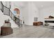 Grand foyer with a staircase, high ceilings, and modern decor; a welcoming entrance at 2008 Arbor Forest St, Las Vegas, NV 89134