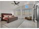 Serene main bedroom with a ceiling fan and well-lit windows at 2008 Arbor Forest St, Las Vegas, NV 89134