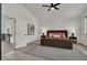 Bright bedroom featuring neutral tones, wood-look floors, and a walk-in closet at 2008 Arbor Forest St, Las Vegas, NV 89134