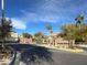 Landscaped entrance to the Canyon Oaks neighborhood with stone signage and mature trees at 2008 Arbor Forest St, Las Vegas, NV 89134