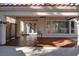 Spacious covered patio with stamped concrete, offering a relaxing outdoor space with views of the home's backyard at 2008 Arbor Forest St, Las Vegas, NV 89134