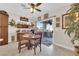 Cozy dining area with an outdoor patio view, built-in wine rack, and traditional decor at 2244 Garden City Ave, Henderson, NV 89052