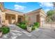 Charming exterior entrance with a well-maintained lawn and walkway leading to the front door at 2244 Garden City Ave, Henderson, NV 89052