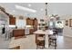 Spacious kitchen with stainless steel appliances, a kitchen island, and a view of the backyard at 2244 Garden City Ave, Henderson, NV 89052