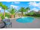 Backyard oasis showcasing a refreshing pool surrounded by lush landscaping and seating at 2244 Garden City Ave, Henderson, NV 89052