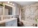 Elegant bathroom featuring a luxurious soaking tub, designer tile, and modern fixtures at 2345 Steinke Ln, Las Vegas, NV 89108