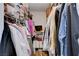 Organized closet with clothing racks, shelving, and storage bins for efficient storage at 2345 Steinke Ln, Las Vegas, NV 89108