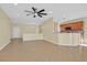 Open-concept living space seamlessly connects the living room to the kitchen at 2405 Gamma Ray Pl, Henderson, NV 89044