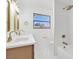 Modern bathroom showcasing double sinks, quartz counters, and stylish gold fixtures at 2415 La Estrella St, Henderson, NV 89014