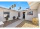 Inviting entryway with desert landscaping and a covered front porch at 2415 La Estrella St, Henderson, NV 89014