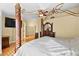 An angle of the large main bedroom showcasing the detailed ceiling and the wood flooring at 255 El Camino Verde St, Henderson, NV 89074