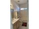 Full bathroom featuring a shower-tub combination and stylish vanity at 2694 Hillgrass Rd, Las Vegas, NV 89123