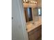 Bathroom with vanity, mirror, and lighting at 2694 Hillgrass Rd, Las Vegas, NV 89123