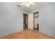 Standard bedroom with hardwood floors, a ceiling fan and a closet at 2712 Rialto Rd, Las Vegas, NV 89108