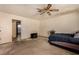 Bedroom featuring a ceiling fan, a window and a sliding door closet at 2712 Rialto Rd, Las Vegas, NV 89108