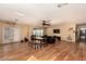 Spacious living room with wood floors, ceiling fan, and french doors to the patio at 2712 Rialto Rd, Las Vegas, NV 89108