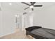 Bedroom featuring a carpeted floor, ceiling fan, and access to a bathroom and closet at 2724 High Echelon Rd, North Las Vegas, NV 89086