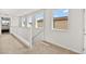 Upstairs hallway with large bright windows at 2724 High Echelon Rd, North Las Vegas, NV 89086