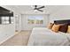 Relaxing main bedroom featuring a tray ceiling, ceiling fan, and neutral carpeting at 2724 High Echelon Rd, North Las Vegas, NV 89086