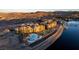 Lakeside condos overlooking a community pool and adjacent to boat marina and a picturesque lake view at 30 Via Mantova # 202, Henderson, NV 89011