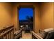 Cozy balcony with chairs and a table, offering a peaceful outdoor space at 30 Via Mantova # 202, Henderson, NV 89011