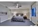 Relaxing main bedroom with a ceiling fan, neutral walls, and coordinated furnishings at 30 Via Mantova # 202, Henderson, NV 89011