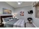 Cozy bedroom features a ceiling fan, neutral walls, and coordinated furnishings at 30 Via Mantova # 202, Henderson, NV 89011