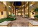 Courtyard with desert landscaping, trees and benches in a lovely outdoor seating area at 30 Via Mantova # 202, Henderson, NV 89011