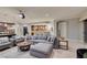 Bright living room with bar seating and views into the kitchen at 30 Via Mantova # 202, Henderson, NV 89011