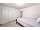 Bedroom featuring tile flooring, a closet, and a minimal aesthetic at 3163 High View Dr, Henderson, NV 89014