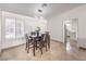 Bright dining area with tile flooring and modern light fixture, perfect for Gathering meals at 3163 High View Dr, Henderson, NV 89014