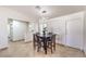 Dining room featuring tile floors, modern light fixture and entry way at 3163 High View Dr, Henderson, NV 89014