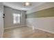 Bedroom with neutral walls, window with plantation shutters, and ceiling fan at 3360 Cactus Shadow St # 102, Las Vegas, NV 89129