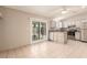 Bright kitchen features tile floors, stainless steel appliances, and breakfast bar with stone accents at 3730 Greenwood Dr, Las Vegas, NV 89103